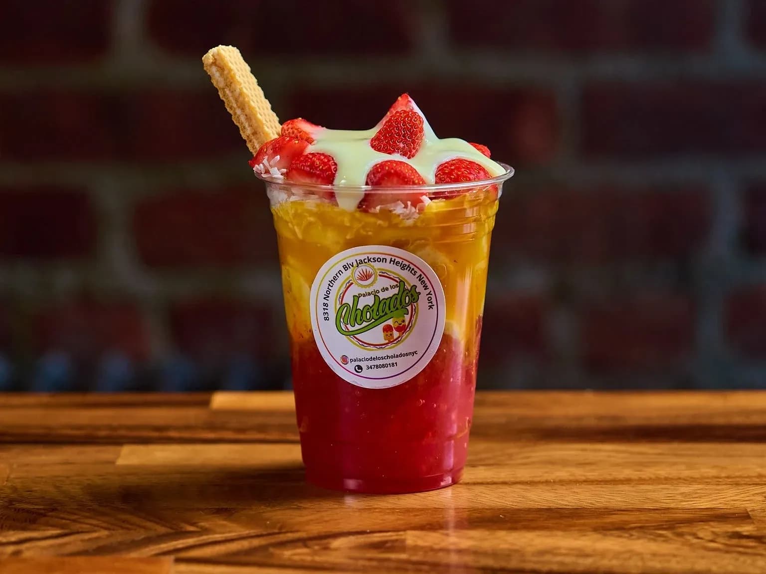 Cholado with shaved ice, strawberries, condensed milk and a wafer